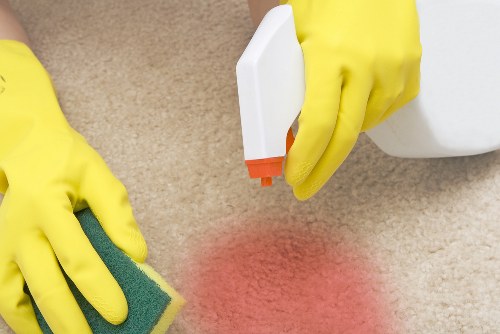 Professional cleaners in Belsizepark working in a modern home